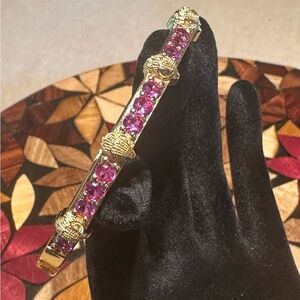 Sold

Kurt Geiger Gold Bracelet with Vibrant Pink Gems